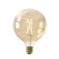 Glowing vintage light bulb on white background