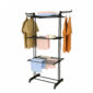 Black clothes rack with hanging and folded clothes.