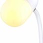 White desk lamp with soft yellow lighting.